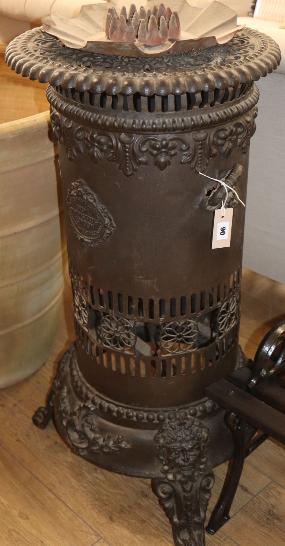 A Brown, Michel and Pace iron stove, H.86cm